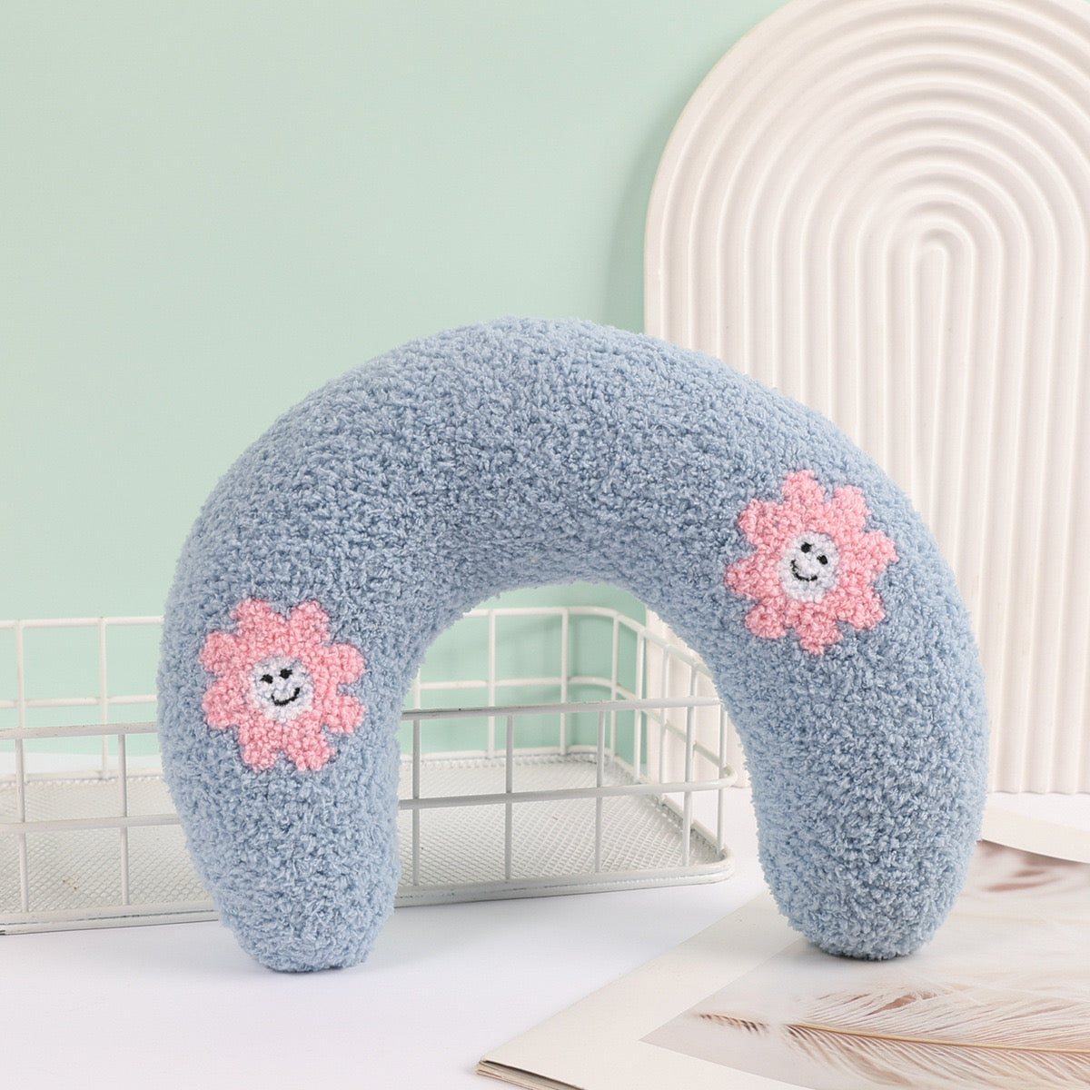 Almohada pequeña en forma de U