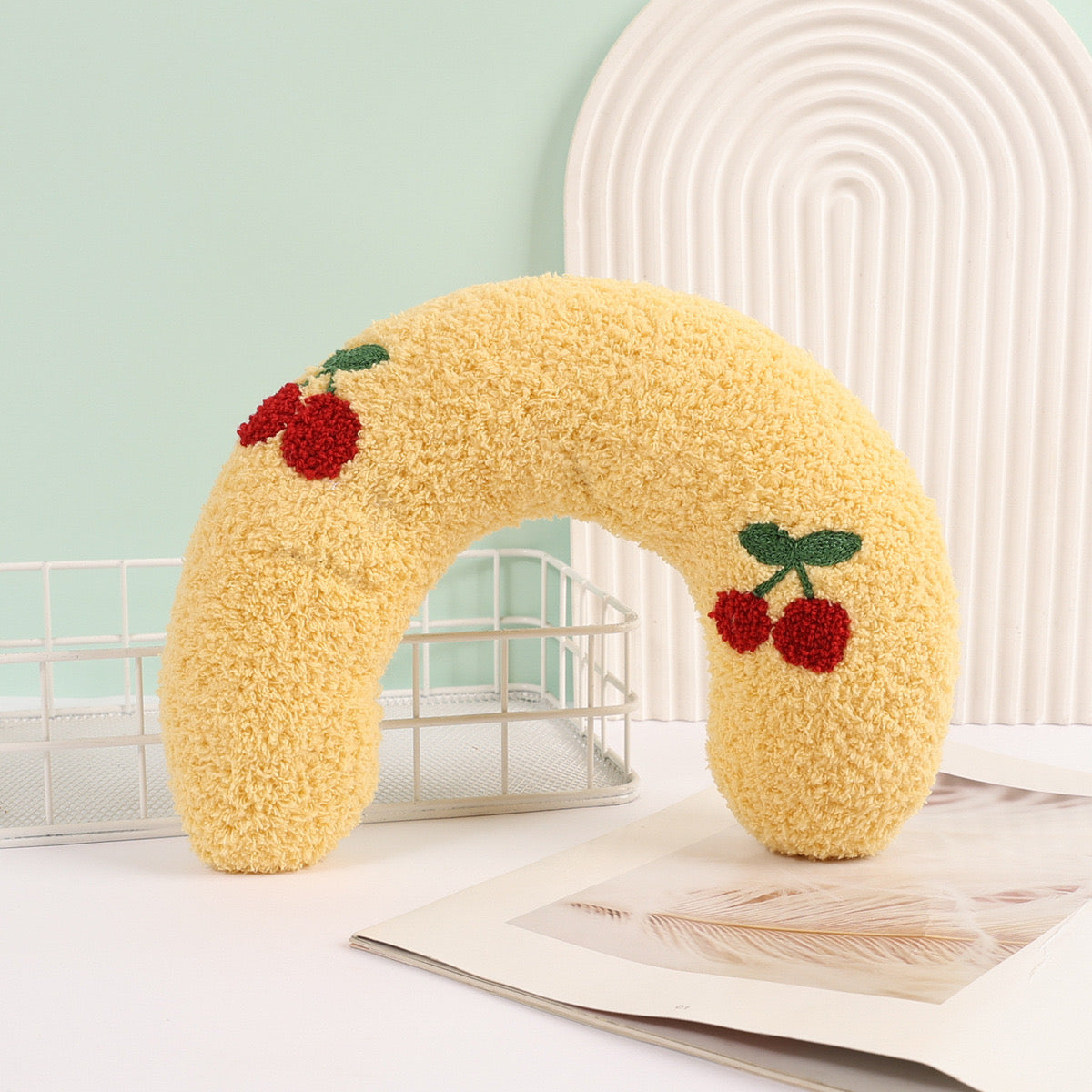 Almohada pequeña en forma de U