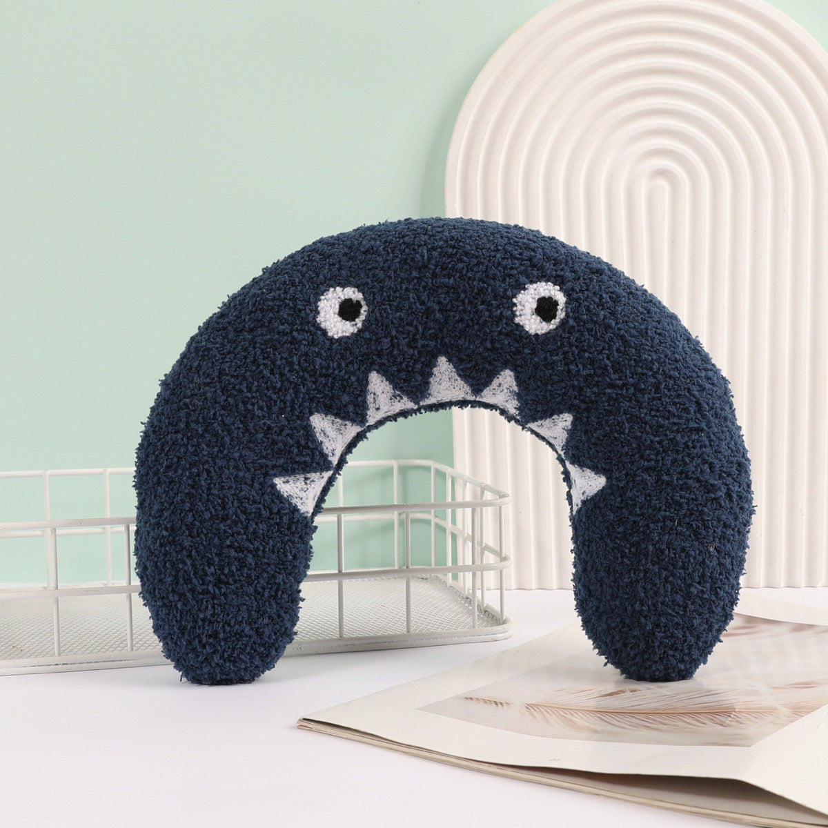 Almohada pequeña en forma de U